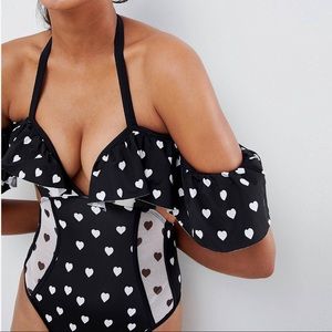 One piece bathing suit with hearts and cut outs